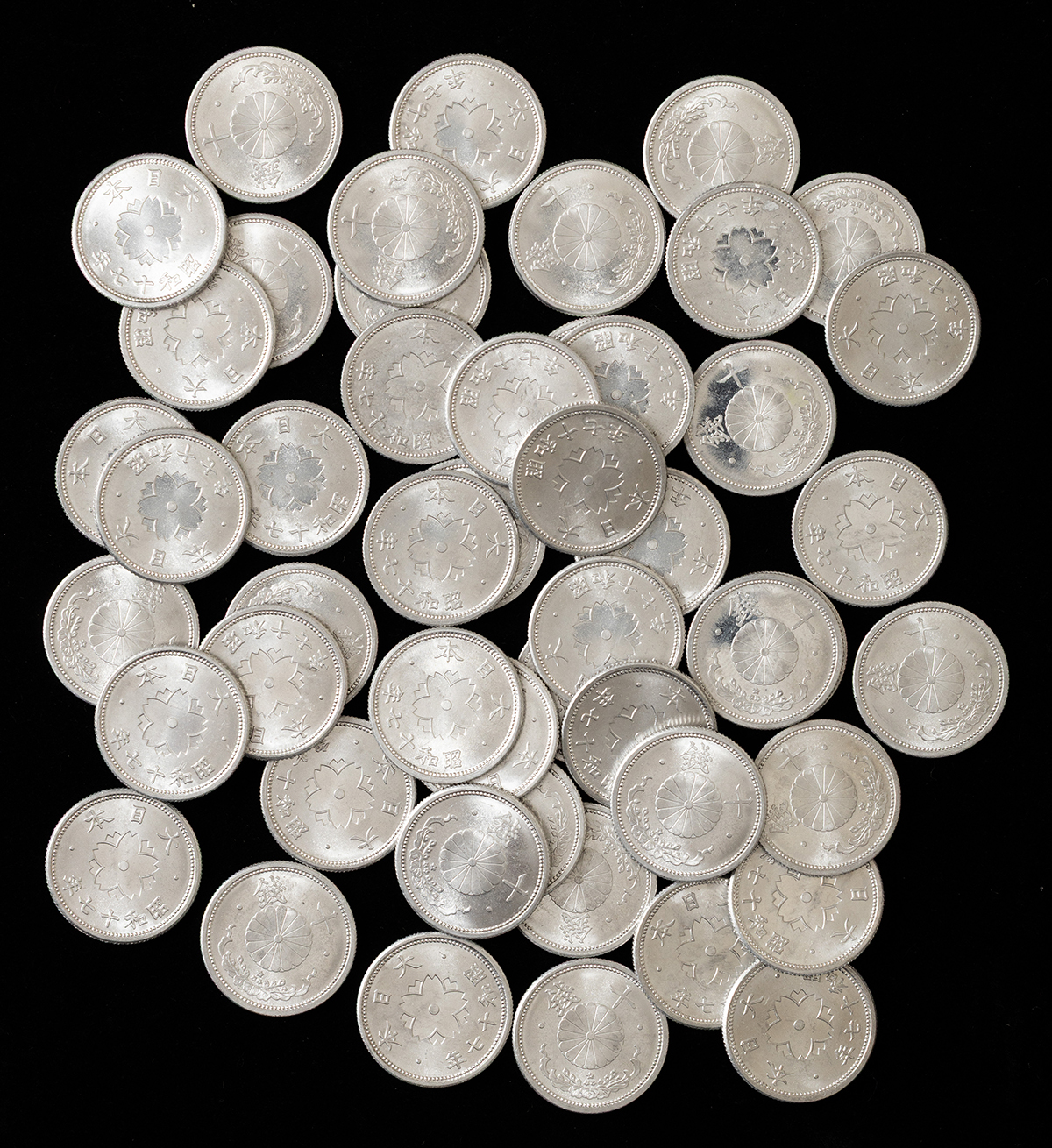 貨幣博物館 | 菊10銭アルミ貨 計50枚（昭和17年）（ロール出し